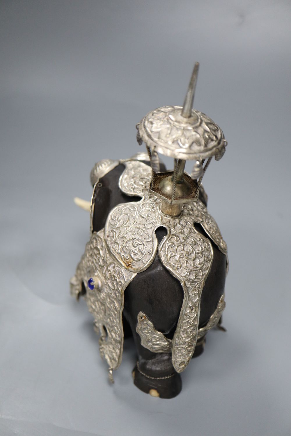 A South Staffordshire enamel box, a silver-mounted ebony elephant and a gilt box